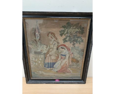 A framed Victorian woodwork tapestry picture. 22' x 19'