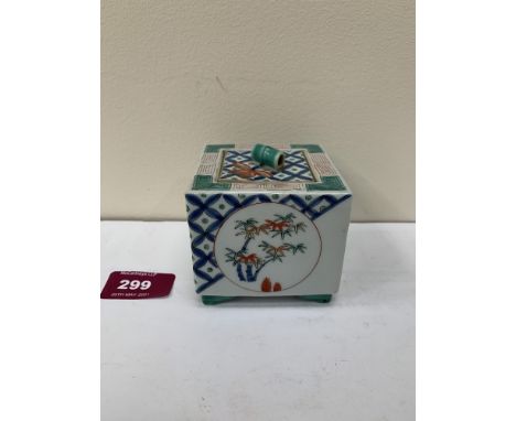 A Chinese pot-pourri pot, of square form with cover, painted in coloured enamel with prunus and diaper decoration. 2¾' wide