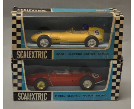 Two boxed Scalextric Cars: C.54 Lotus and C.62 Ferrari. Reproduction perspex in both boxes. (2)