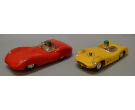 2 unboxed Tri-Ang Scalextric cars: C.57 Aston Martin and C.56 Lister Jaguar. (2)