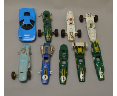9 assorted Scalextric vintage car body shells.