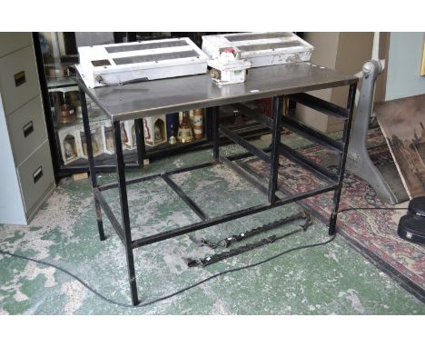 An engineer's work bench with stainless steel top.