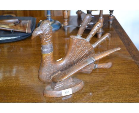 A Persian knife block set as a bird, containing carving knife, fork etc 