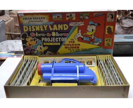 A Chad Valley Disneyland Give a Show projector, with 112 colour slides