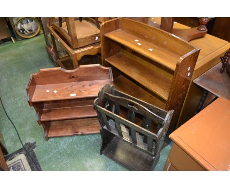 An oak four tier waterfall bookcase; a wall mounted three tier book shelf; an oak magazine rack (3)