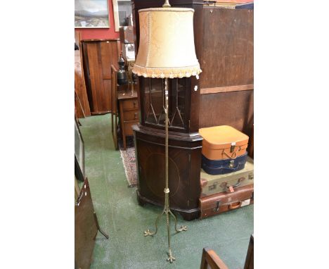 A gilt metal standard lamp.