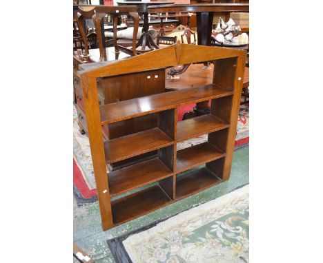 A golden oak Art Deco wall hanging bookshelf, architectural pediment, mahogany and satinwood marquetry to shelves. 