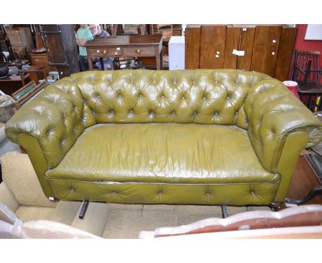 An early 20th century leather Chesterfield sofa 