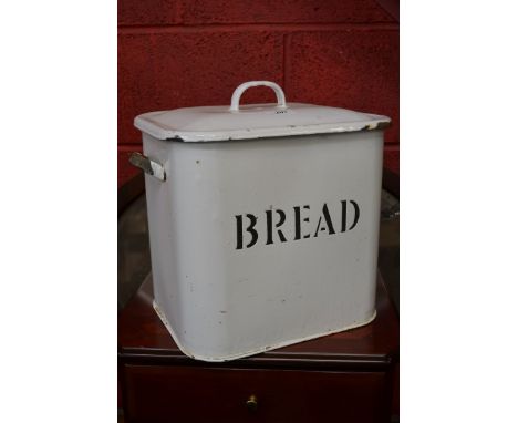 Kitchenalia-an early 20th century white enamel bread bin, a conforming milk pail, butter churn, tins, Rowntrees and others te