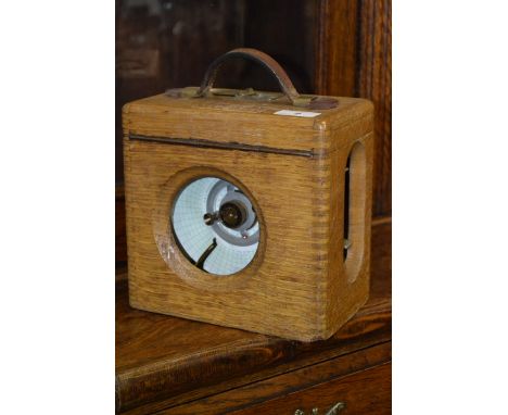 An oak cased Automatic Timing Clock Company pigeon clock