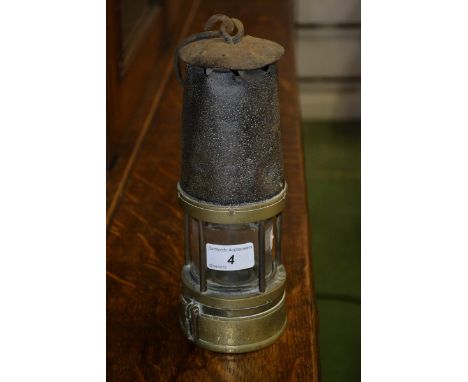 A 19th century brass and metal miners lamp