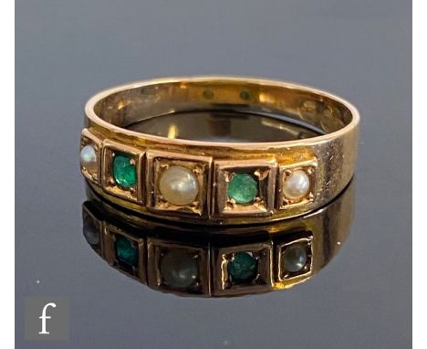 A 15ct hallmarked five stone emerald and split pearl ring, each stone to a square setting, weight 3g, ring size R, London 194