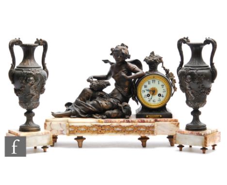 A late 19th to early 20th Century French variegated marble and spelter clock garniture, the clock in a barrel form case surmo