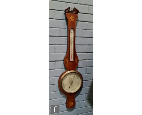 A 19th Century inlaid mahogany wheel barometer by Pensotti &amp; Comoli, fan paterae decorated shell case, circular brass dia