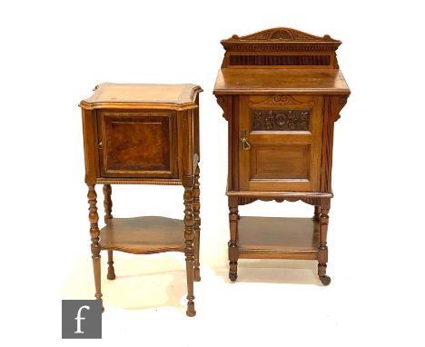 A late 19th Century walnut bedside cupboard enclosed by a single carved panel door, on turned legs united by an undertier, wi