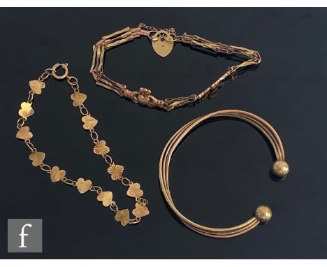 Three 9ct items to include a three bar gate bracelet, a fancy heart design bracelet and a torque bangle, total weight 11.4g, 