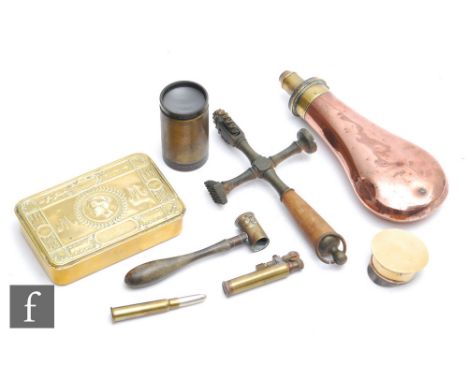 A World War One brass cigarette box, a copper powder flask, a trench art officer's peaked cap, a lighter, a pastry cutter etc