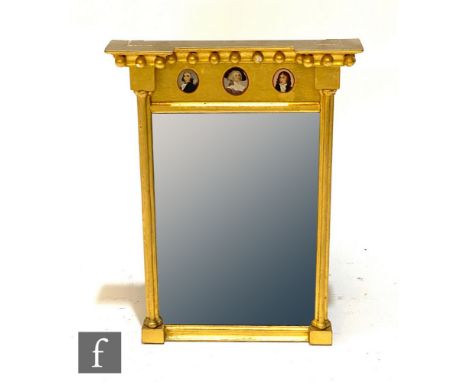 A 19th Century inverted break front wall mirror with ball applied pediment above three later painted portrait cameos to the f