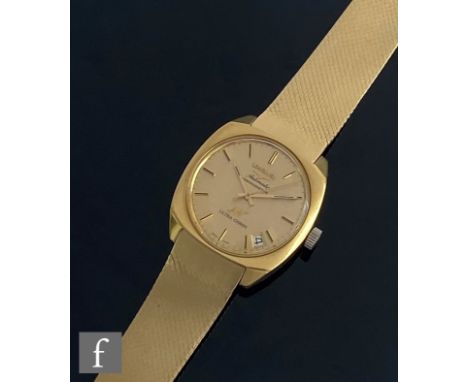 A 18ct Longines automatic Ultra Chron chronometer wrist watch with gilt batons and date facility to a champagne dial, case di