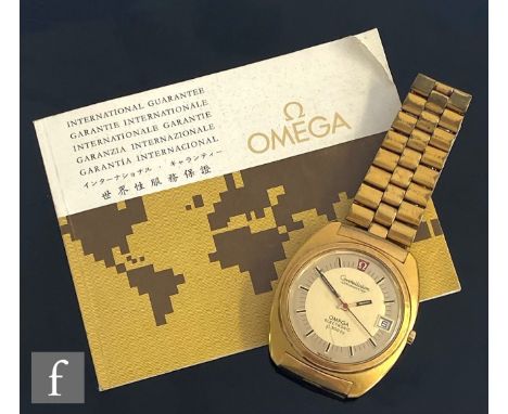 A gold plated Omega Constellation chronometer Electronic f3300 Hz wrist watch, batons and date facility to a two tone champag