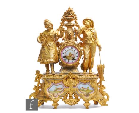 A 19th Century French gilt mantel clock mounted with a boy and girl, one holding an umbrella, porcelain dial and panel cartou