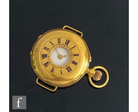 An early 20th Century 18ct crown wind, half hunter fob watch, Roman numerals to a white enamelled dial, with 18ct dust cover,