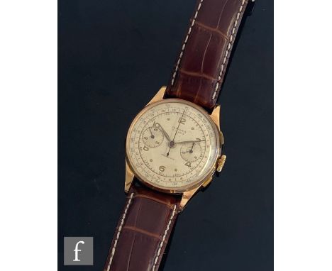 A mid 20th Century 18ct Temporis chronograph wrist watch with twin subsidiary dials to a circular silvered dial, case diamete