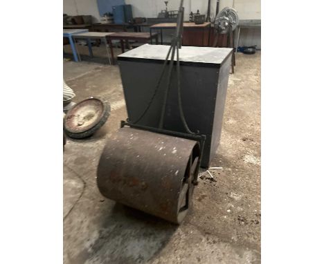 A large cast garden roller