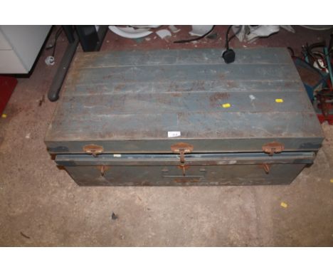 A LARGE TIN TRUNK