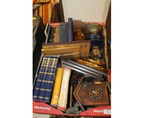 A TRAY OF COLLECTABLE ITEMS, TO INCLUDE CUCKOO CLOCK, PARAFFIN LAMP, BOOKS, ETC
