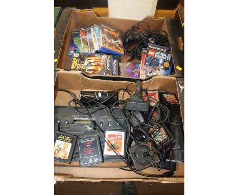 A QUANTITY OF COMPUTERS TO INCLUDE AN ATARI 2600 TOGETHER WITH GAMES TO INCLUDE PAC-MAN, SPIDER-MAN, ETC TOGETHER WITH A PLAY