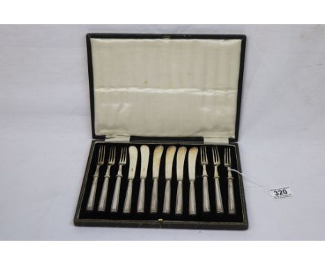 Cased six place Dessert knife &amp; fork set with Hallmarked Silver handles