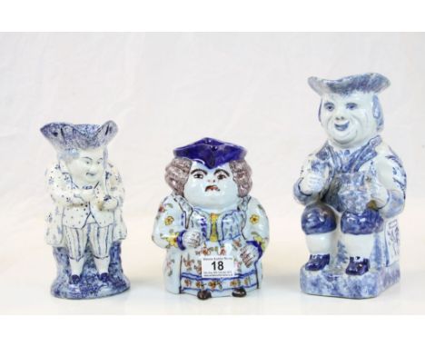 Two 19th Century blue &amp; white Delft ceramic Toby jugs to include the Snuff Taker &amp; a French Faience "Female" example 
