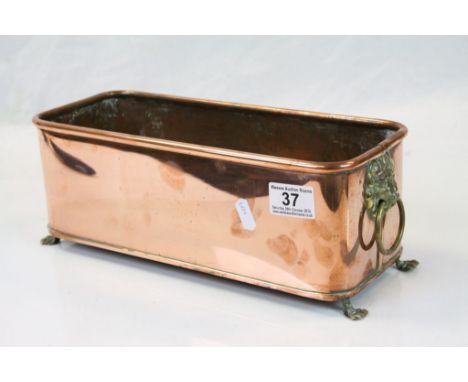 Vintage oblong Copper Planter with Brass Lion masque handles &amp; paw feet, measures approx 32.5 x 13 x 12.5cm &amp; marked 