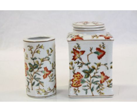 Contemporary oriental style ceramic tea caddy with floral and leaf decoration, a similar vase/brush pot, a green bottle vase 