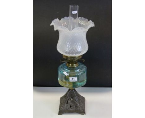 19th Century Oil lamp with Cast Iron base &amp; Brass fittings, has a blue Glass reservoir, flared Glass shade &amp; glass ch