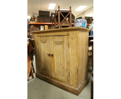 19th century Pine Cupboard with two panel doors opening to reveal two shelves, 97cms wide x 40cms deep x 92cms high