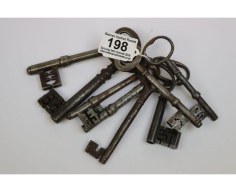 Eight large vintage Iron Door keys with complex fittings