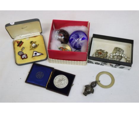 Mixed collectables to include Glass Paperweights, Enamel Badges, Buckles etc