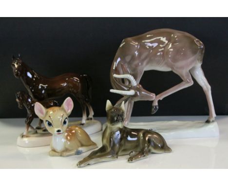 Four ceramic animals including wade Bambi etc 