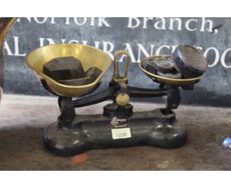 A set of Libra Scale Co. cast iron scales