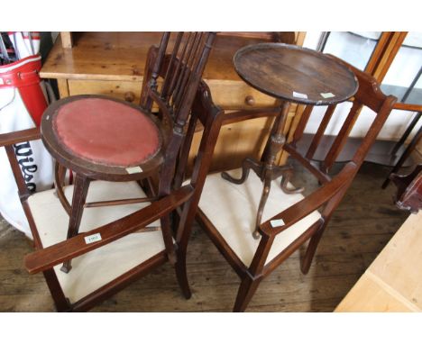 An oak tripod table and three 1920's oak chairs