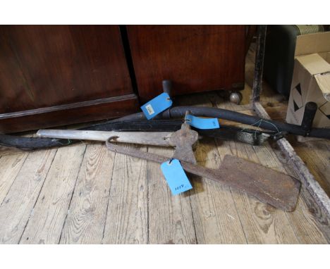 A vintage pole axe with a scythe and a cleaver