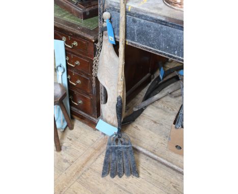 A vintage eel spear with a yoke