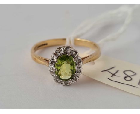 A peridot and diamond cluster 9ct dress ring size O 2.2g inc