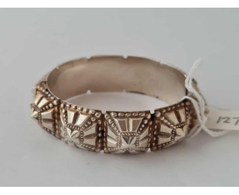 A unusual hinged silver bangle
