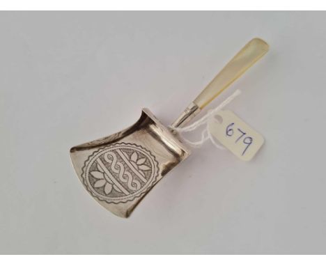 A George III bright cut shovel shaped caddy spoon with M.OP handle Birm 1810 by WP