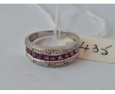 A three row pink sapphire and diamond half eternity ring 9ct white gold size P    3 gms