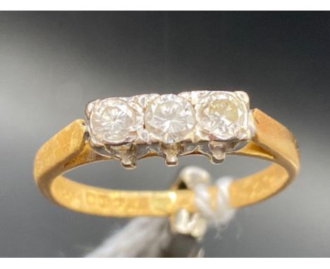 A good quantity bright three stone diamond ring