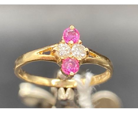 A pretty ruby and diamond lozenge shaped ring 9ct